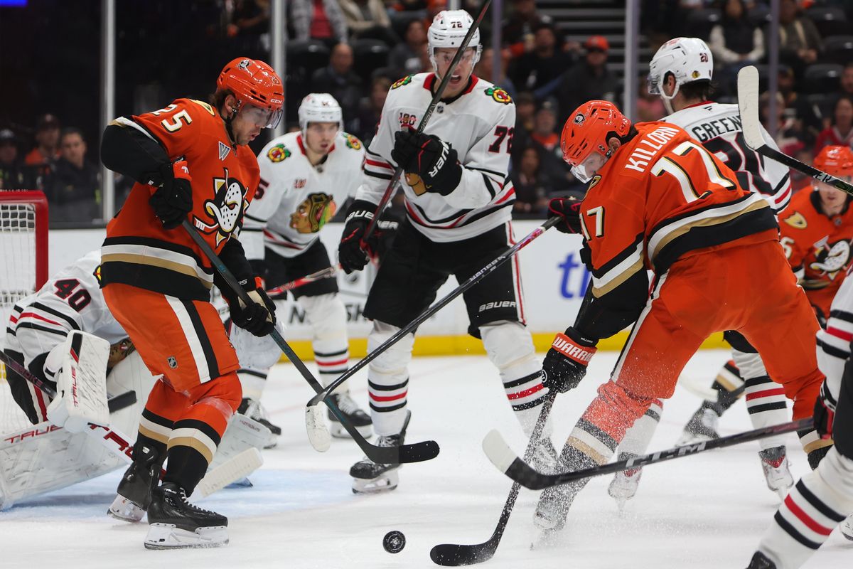 #91 C Leo #17 LW Alex Killorn of the Anaheim Ducks battles for the puck during an NHL game against the Chicago Blackhawks on December 7, 2025 in Anaheim, CA. #91 C Leo #17 LW Alex Killorn of the Anaheim Ducks battles for the puck during an NHL game against the Chicago Blackhawks on December 7, 2025 in Anaheim, CA.