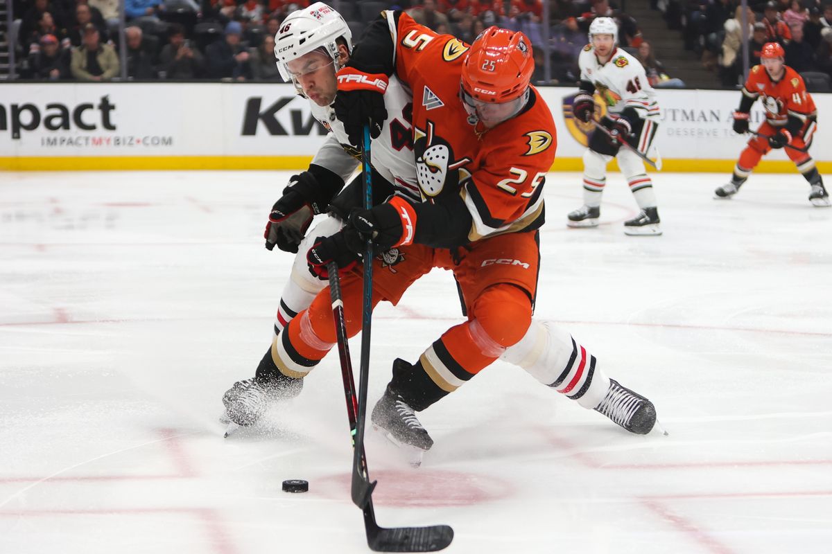 #25 C Ryan Poehling of the Anaheim Ducks battles for the puck during an NHL game against the Chicago Blackhawks on December 7, 2025 in Anaheim, CA. #25 C Ryan Poehling of the Anaheim Ducks battles for the puck during an NHL game against the Chicago Blackhawks on December 7, 2025 in Anaheim, CA.