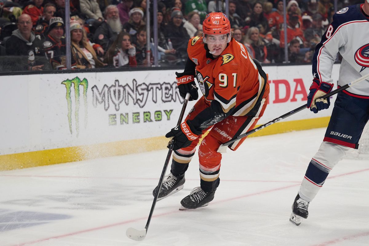 Leo Carlsson #91 of the Anaheim Ducks looks for a pass against the blue Jackets at the Honda Center on December 20,2025 in Anaheim, California.