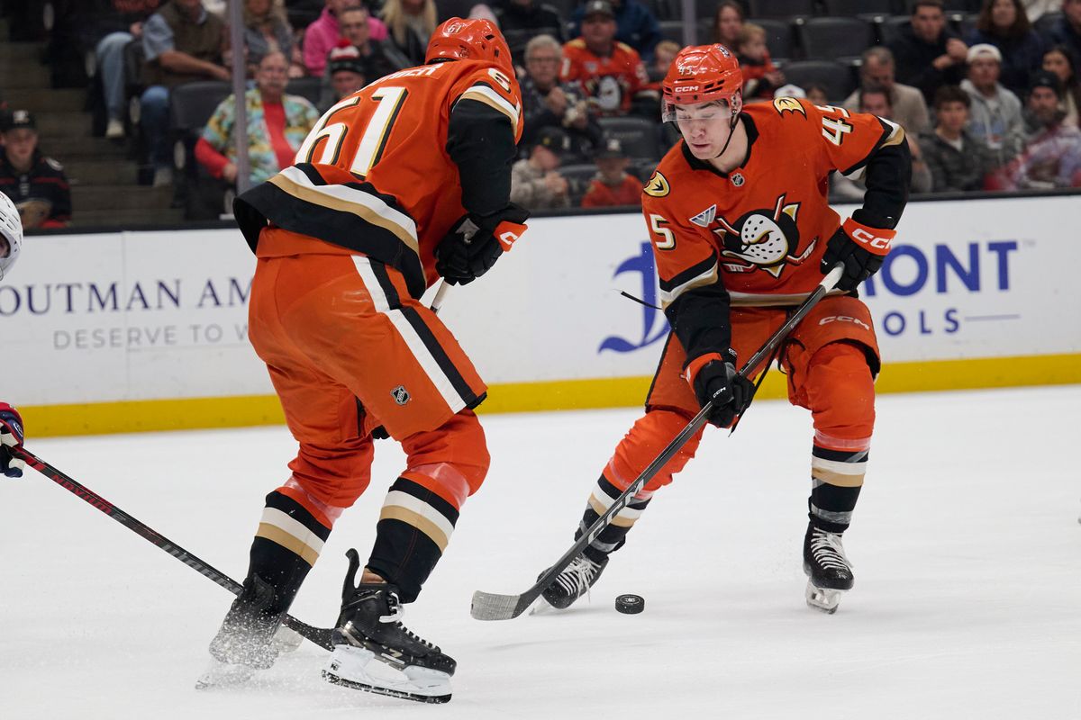 Beckett Sennecke #45 of the Anaheim Ducks gains possession against the Blue Jackets at the Honda Center on December 20,2025 in Anaheim, California.