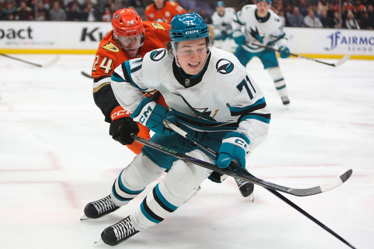 #71 C Macklin Celebrini of the San Jose Sharks chases after the puck during an NHL game against the Anaheim Ducks on December 29, 2025 in Anaheim, CA.