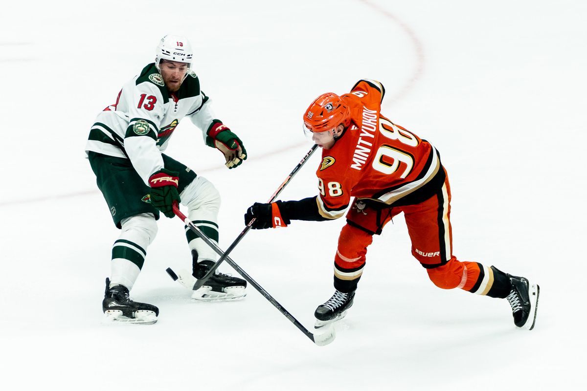 Anaheim Ducks defender Pavel Mintyukov (98) shoots the puck during an NHL hockey game against the Minnesota Wild, Friday, January 2nd, 2026 in Anaheim, California
