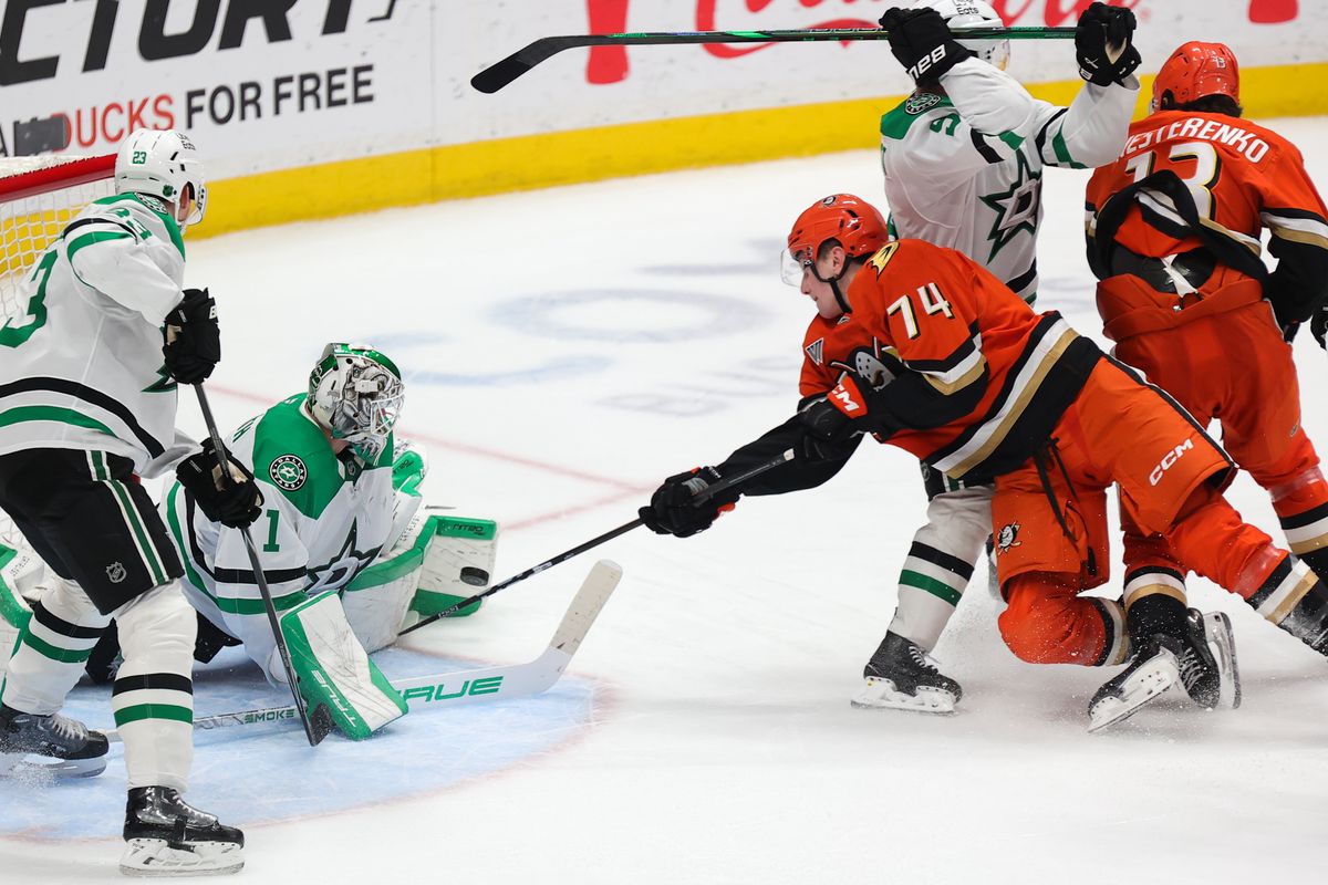 Anaheim Ducks defenseman Ian Moore (74) takes a shot on goal during an NHL game against the Dallas Stars on January 13, 2026 in Anaheim, CA.