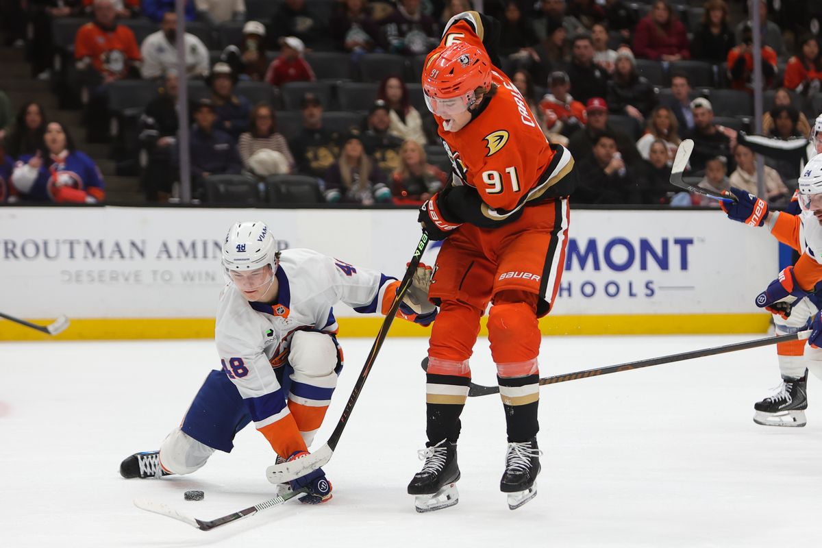 Anaheim Ducks center Leo Carlsson (91) skates with the puck during an NHL game against the New York Islanders on March 4, 2026 in Anaheim, CA.
