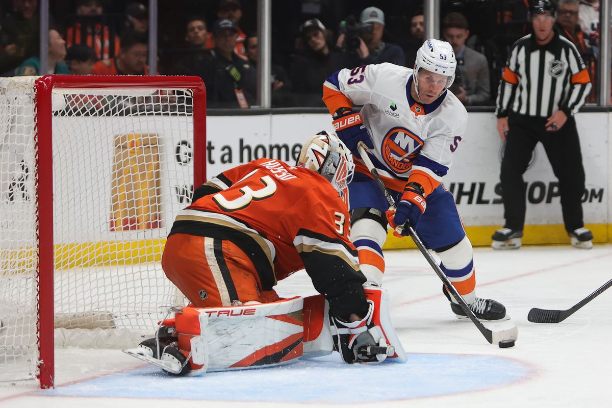 Anaheim Ducks goalie Ville Husso (33) attempts to make a stop during an NHL game against the New York Islanders on March 4, 2026 in Anaheim, CA.