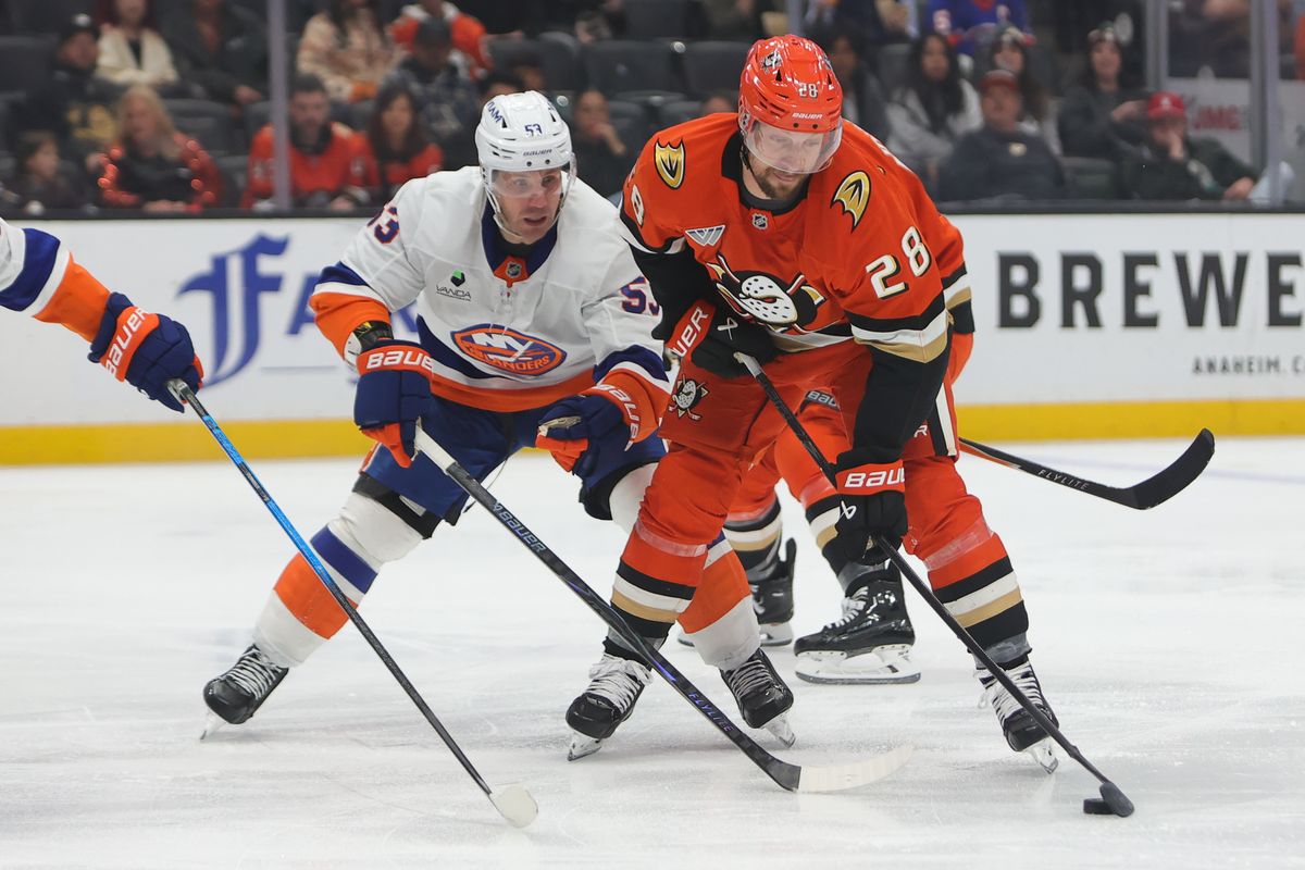 Anaheim Ducks left wing Jeffrey Viel (28) battles for the puck during an NHL game against the New York Islanders on March 4, 2026 in Anaheim, CA.