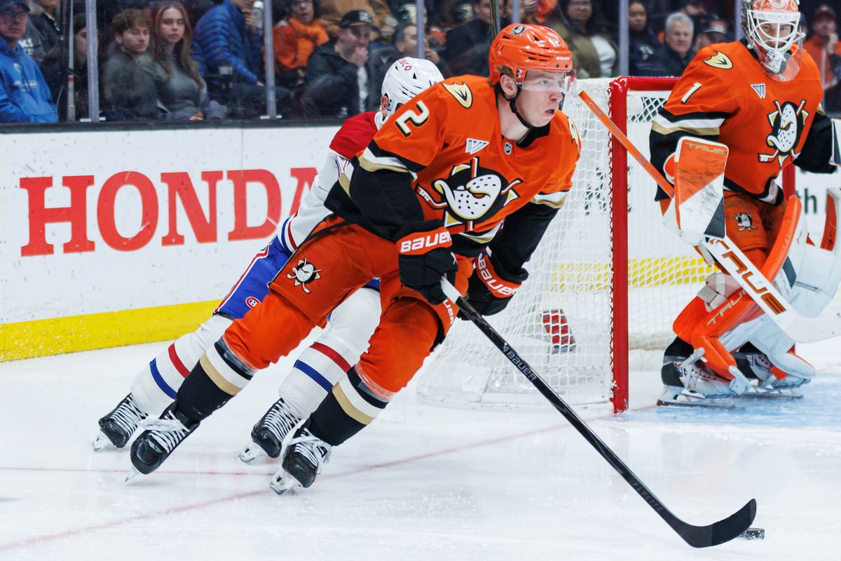 Anaheim Ducks defenseman Jackson LaCombe (2) skates with the puck during an NHL match against the Montreal Canadiens on March 6, 2026 in Anaheim, California.