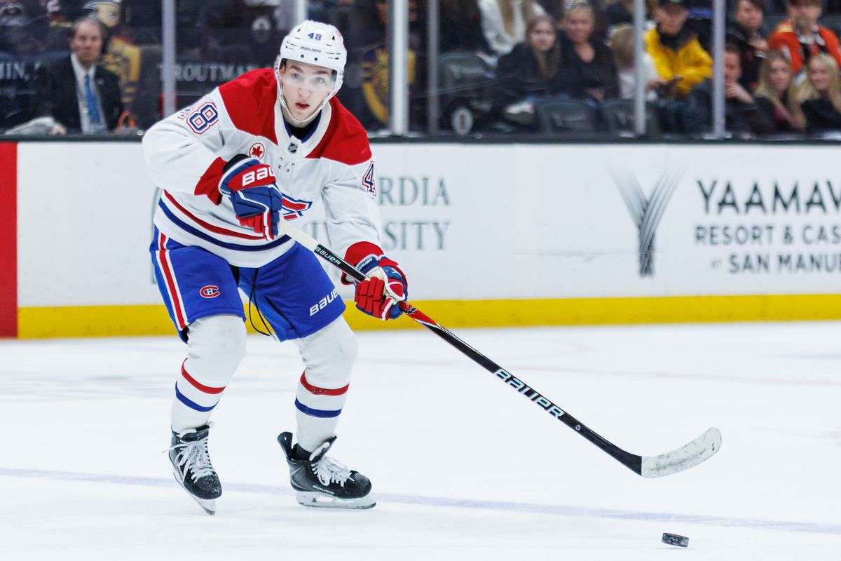 Montreal Canadiens defenseman Lane Hutson (48) looks to pass the puck during an NHL match against the Anaheim Ducks on March 6, 2026 in Anaheim, California.