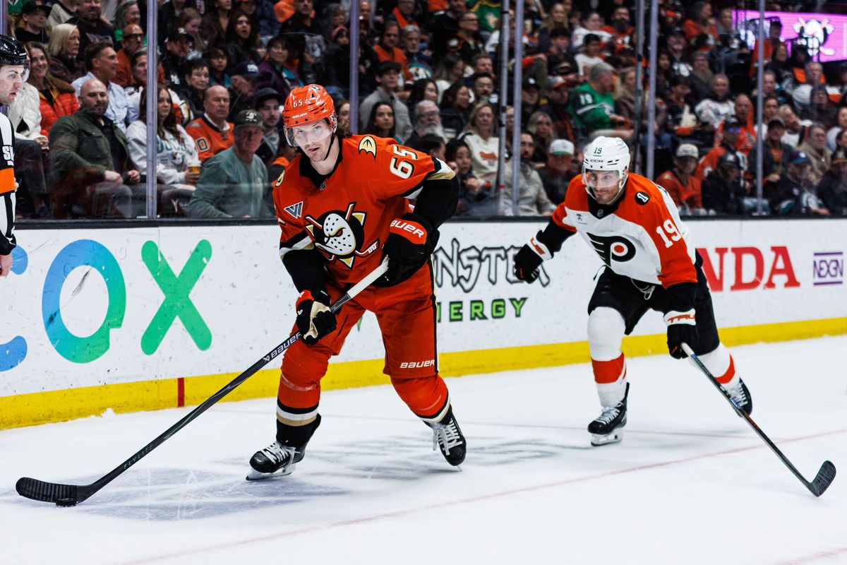Anaheim Ducks defenseman Jacob Trouba (#65) defends the puck during an NHL match against the Philadelphia Flyers on March 18, 2026 in Anaheim, California.
