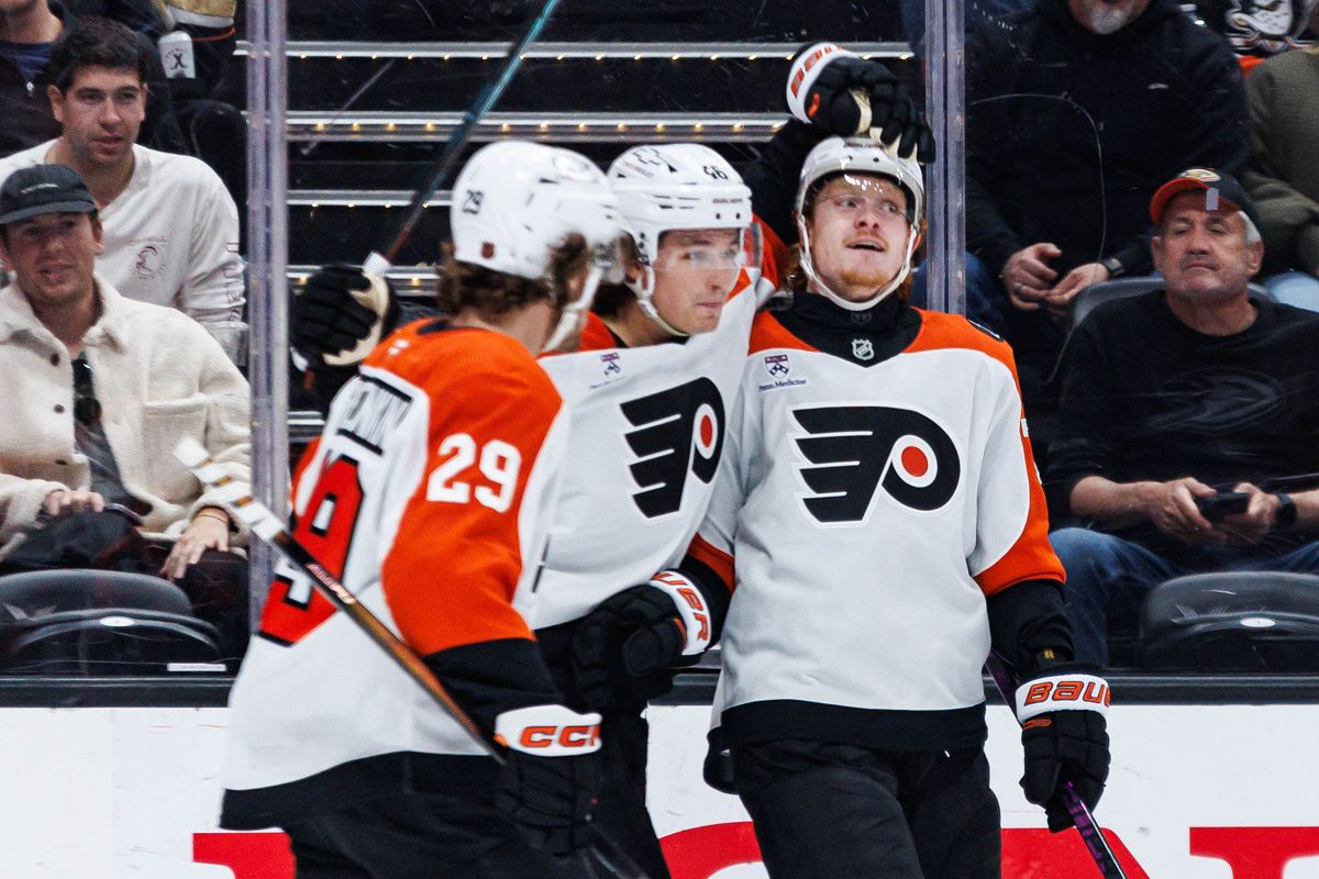 Philadelphia Flyers right wing Owen Tippett (#74) celebrates with teammates after scoring a goal during an NHL match against the Anaheim Ducks on March 18, 2026 in Anaheim, California.