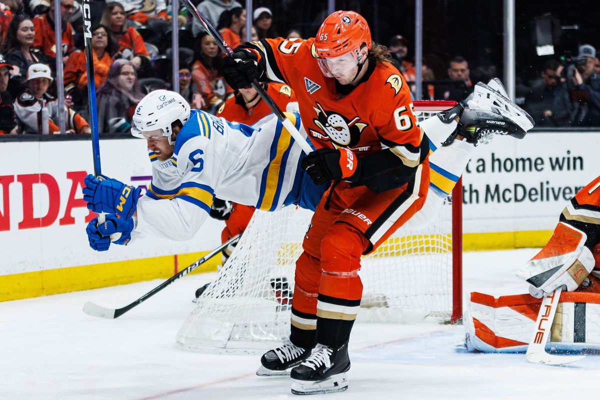 Anaheim Ducks defenseman Jacob Trouba (#65) records a hit on St. Louis Blues defenseman Philip Broberg (#6) during an NHL match against the St. Louis Blues on April 3, 2026 in Anaheim, California. Anaheim Ducks defenseman Jacob Trouba (#65) records a hit on St. Louis Blues defenseman Philip Broberg (#6) during an NHL match against the St. Louis Blues on April 3, 2026 in Anaheim, California.
