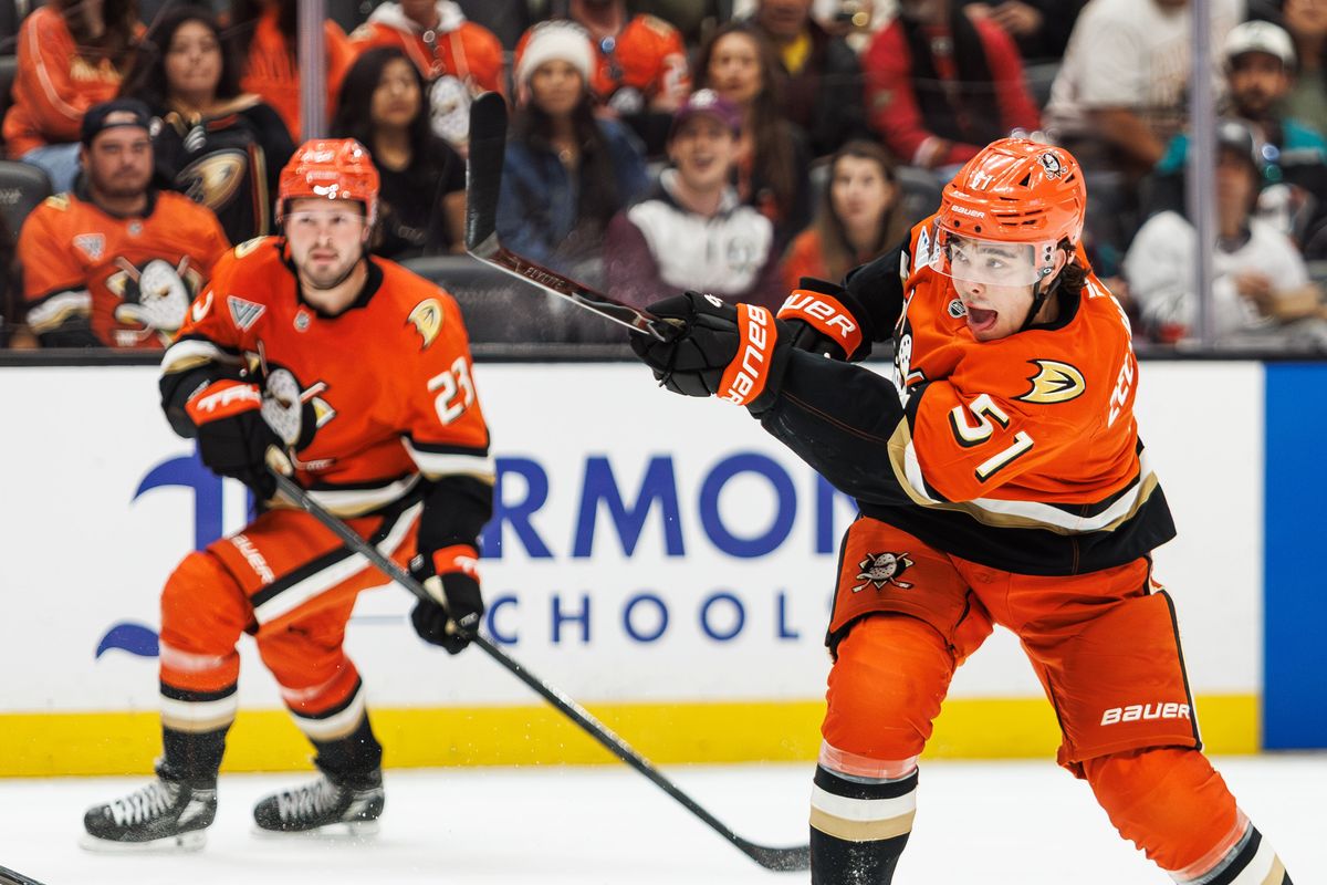 Anaheim Ducks defenseman Olen Zellweger (51) shoots the puck during an NHL hockey game against the Calgary Flames, Saturday April 4, 2026 in Anaheim, Calif.