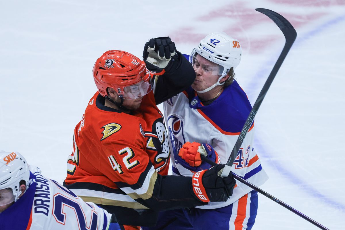 Anaheim Ducks center Tim Washe (42) pushes Edmonton Oilers right wing Kasperi Kapanen (42) during the NHL game against the Edmonton Oilers, Thursday April 30th, 2026 at Honda Center in Anaheim, Calif.