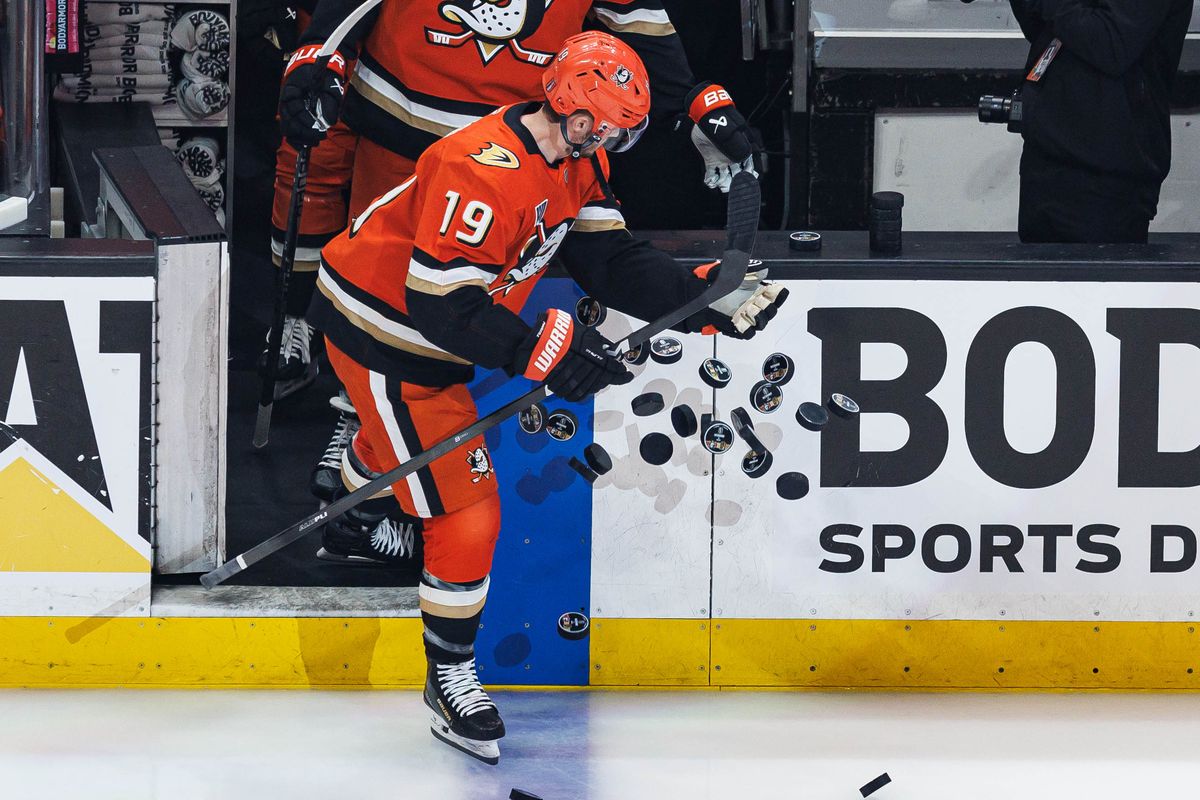 Troy Terry #19 of the Anaheim Ducks knocks over the pucks for warmups before an NHL Stanley Cup Playoffs match against the Vegas Golden Knights on May 8, 2026 at Honda Center in Anaheim, California.