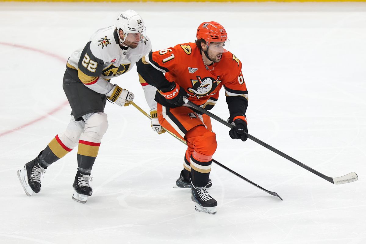 Anaheim Ducks left wing Cutter Gauthier (61) and Vegas Golden Knights right wing Cole Smith (22) chase after the puck during a Stanley Cup Playoff game on May 14, 2026 in Anaheim, CA.