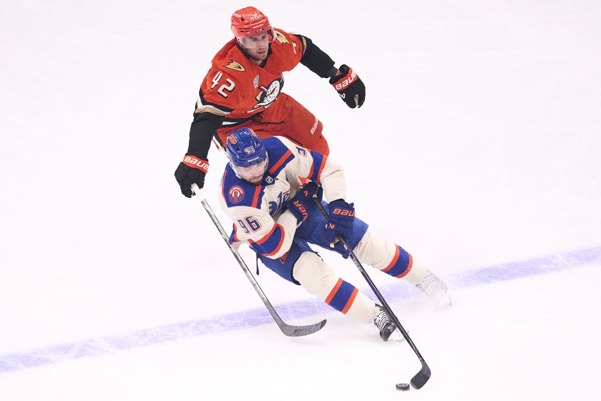 The Anaheim Ducks center Tim Washe #42 reaches for the puck against Edmonton Oilers center Jason Dickinson #16 during an NHL game against The Edmonton Oilers on October 7th, 2026 Honda Center in Anaheim, California. The Anaheim Ducks center Tim Washe #42 reaches for the puck against Edmonton Oilers center Jason Dickinson #16 during an NHL game against The Edmonton Oilers on October 7th, 2026 Honda Center in Anaheim, California.