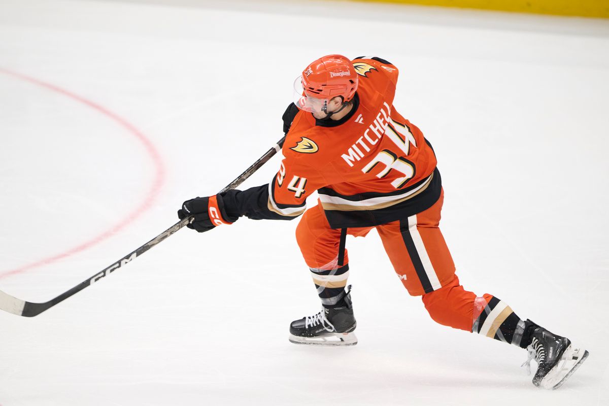 The Anaheim Ducks defender Travis Mitchell #34 shoots a goal attempt during an NHL game against The Edmonton Oilers on October 7th, 2026 Honda Center in Anaheim, California. The Anaheim Ducks defender Travis Mitchell #34 shoots a goal attempt during an NHL game against The Edmonton Oilers on October 7th, 2026 Honda Center in Anaheim, California.