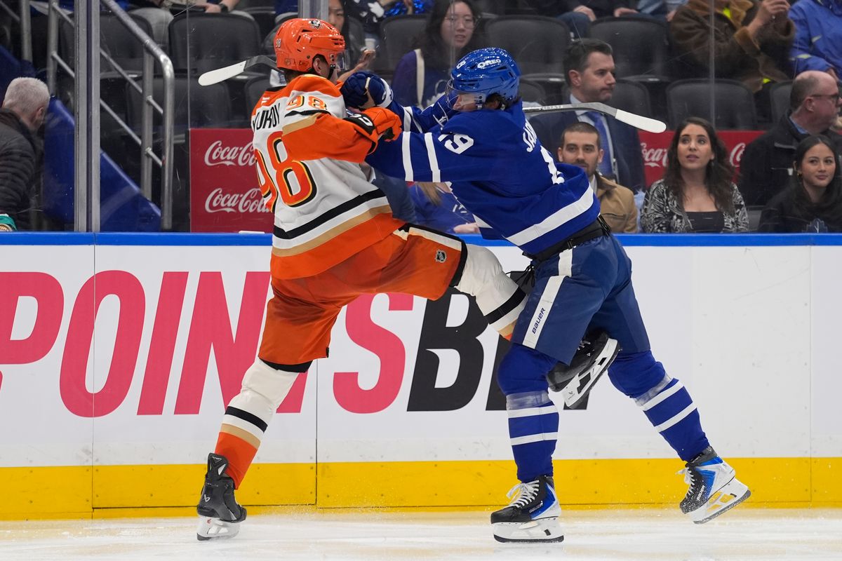 Toronto Maple Leafs forward Calle Jarnkrok (19) checks Anaheim Ducks defenseman Pavel Mintyukov (98) during the third period at Scotiabank Arena. 