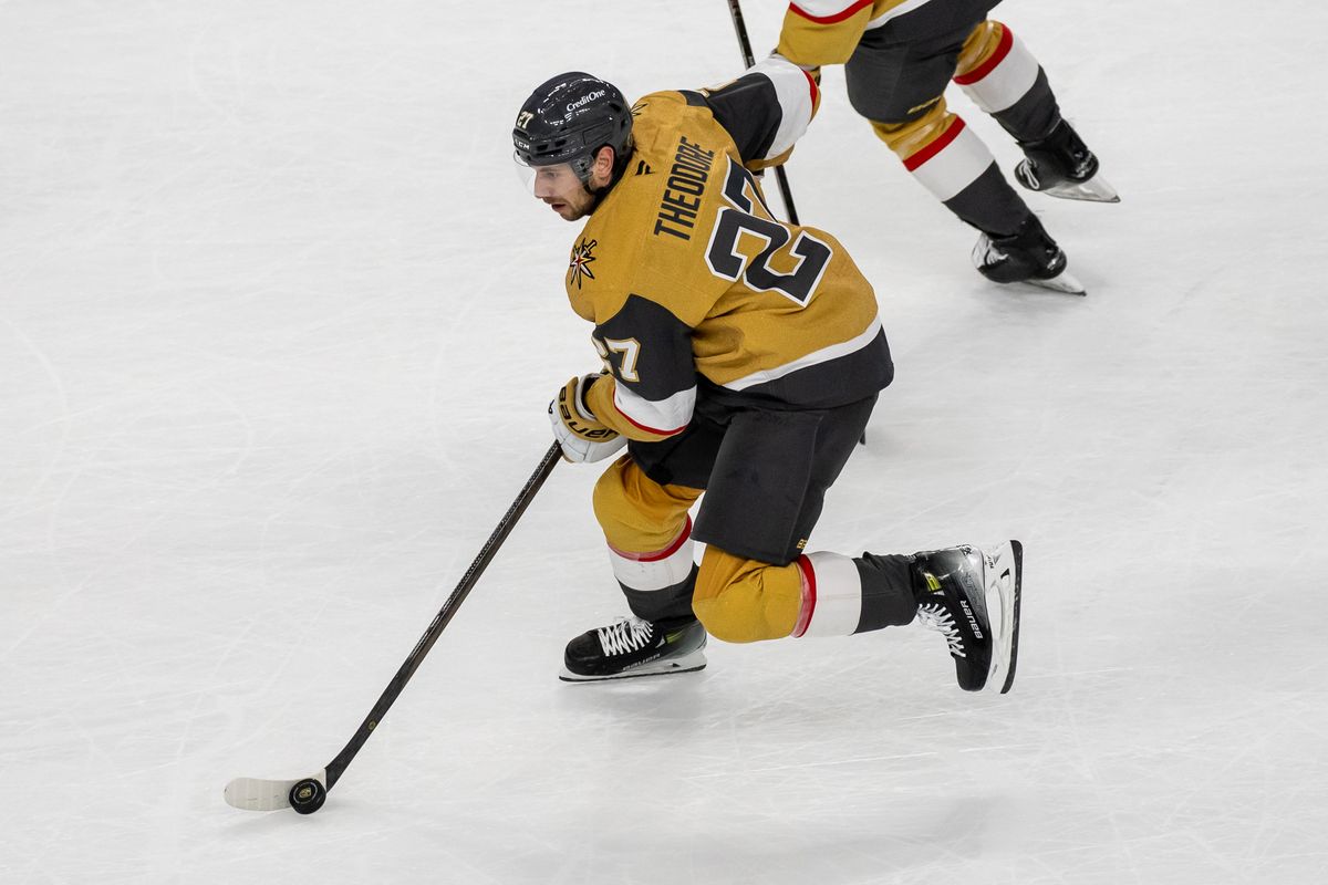 Las Vegas Golden Knights defenseman Shea Theodore (27) skates the puck up the ice during NHL game against Utah Hockey Club on Saturday November 2, 2024 in Las Vegas. Las Vegas Golden Knights defenseman Shea Theodore (27) skates the puck up the ice during NHL game against Utah Hockey Club on Saturday November 2, 2024 in Las Vegas.