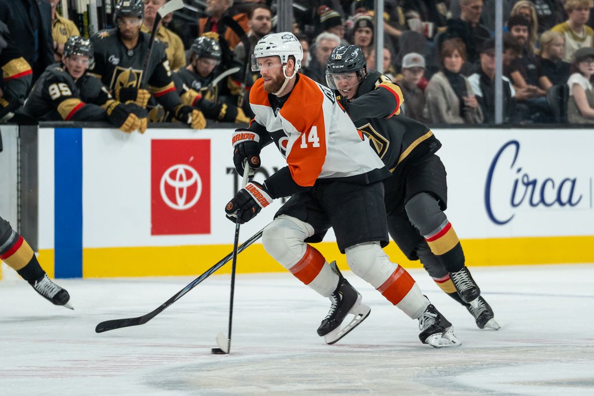 Philadelphia Flyers center Sean Couturier (14) skates the puck down the ice during NHL game against Vegas Golden Knights on Monday Jan. 2, 2025 in Las Vegas.