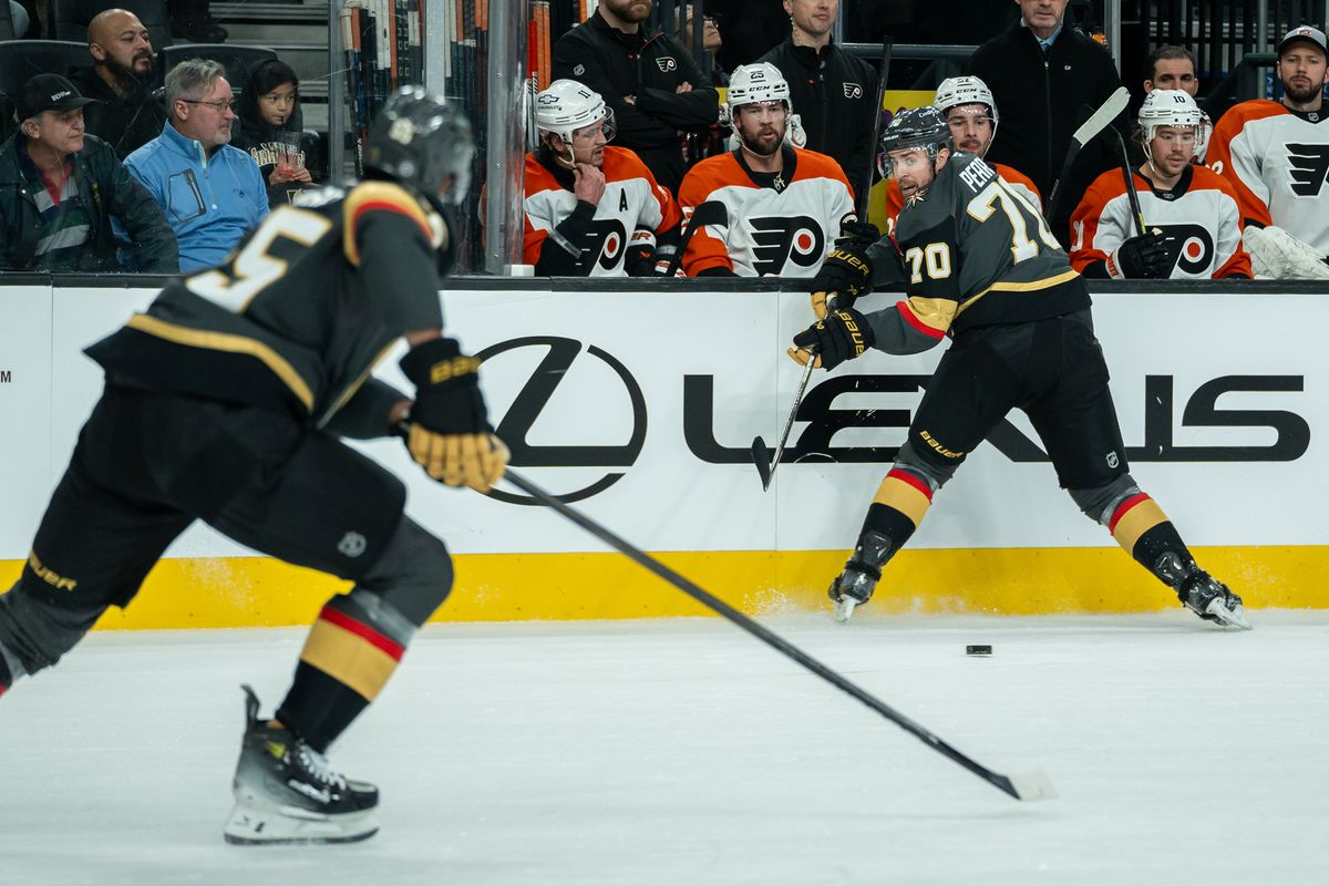 Vegas Golden Knights Tanner Pearson (70) passes the puck to right wind Kegan Kolesar (55) during NHL game against Philadelphia Flyers on Monday Jan. 2, 2025 in Las Vegas.