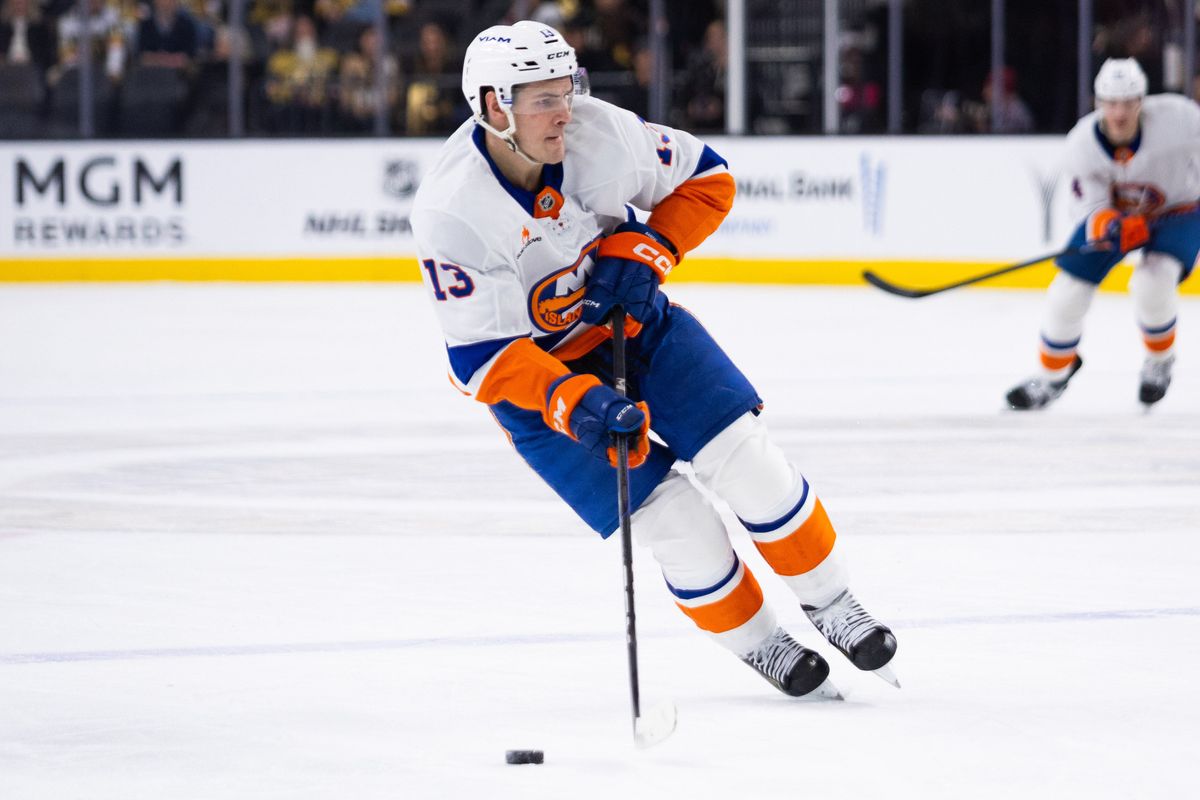  New York Islanders center Matthew Barzal (13) skates the puck up the ice during a NHL game between the Las Vegas Golden Knights and the New York Islanders, Thursday January 9, 2025 in Las Vegas, Nev.