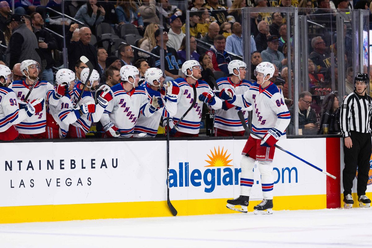 New York Rangers center Adam Edstrom (84) fist bumps teammates on the bench after scoring during a NHL game between the Las Vegas Golden Knights and the New York Rangers, Saturday January 11, 2025 in Las Vegas, Nev.