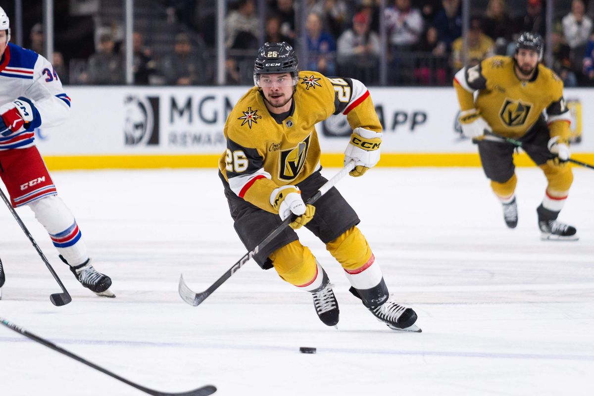 Las Vegas Golden Knights right wing Alexander Holtz (26) skates the puck up the ice during a NHL game between the Las Vegas Golden Knights and the New York Rangers, Saturday January 11, 2025 in Las Vegas, Nev.