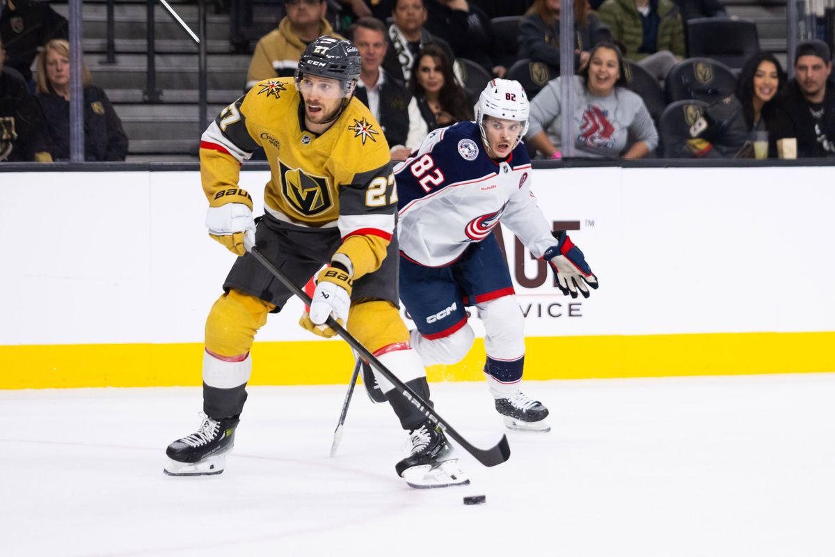 Las Vegas Golden Knights defenseman Shea Theodore (27) looks to shoot the puck during a NHL game between the Las Vegas Golden Knights and the Columbus Blue Jackets, Thursday January 30, 2025 in Las Vegas, Nev.