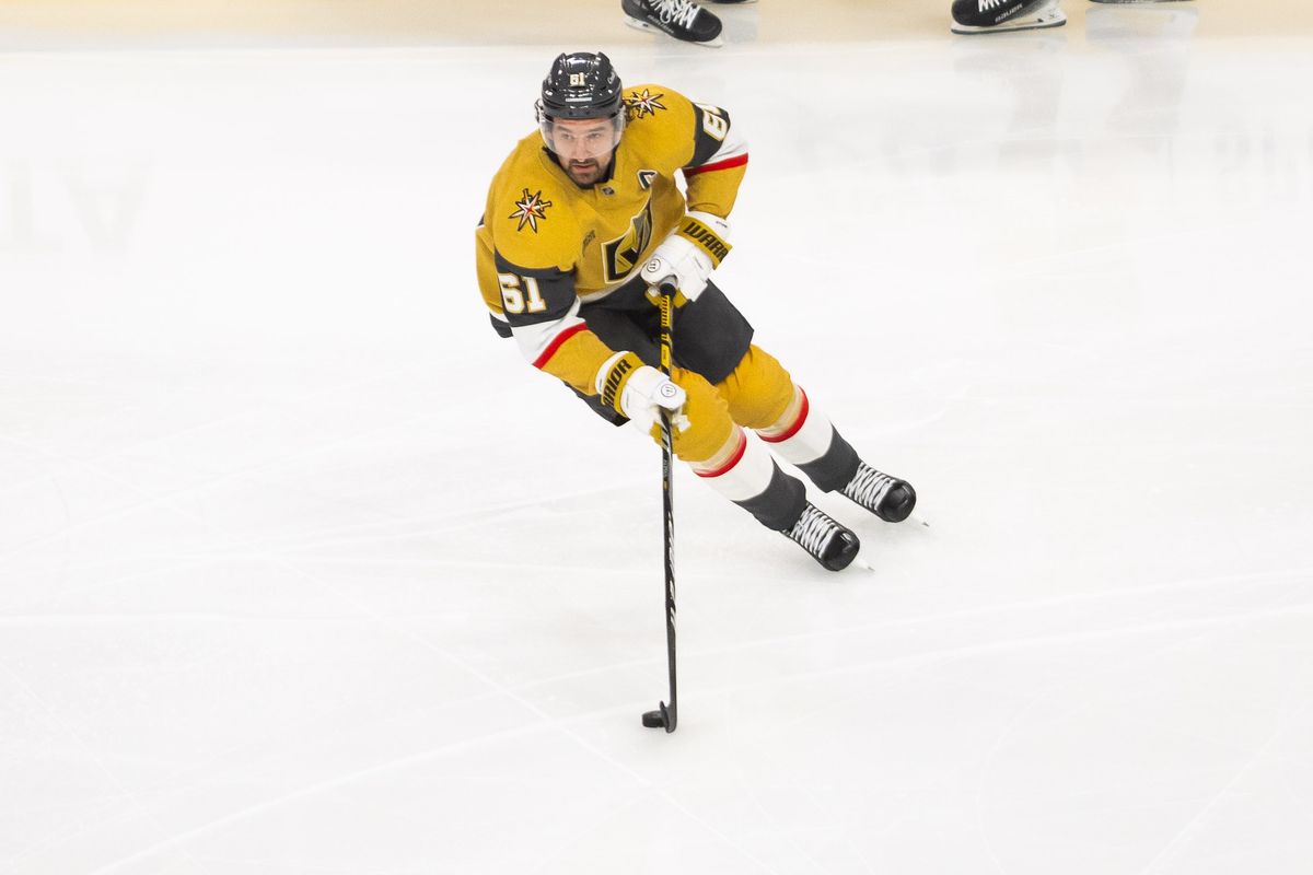 Las Vegas Golden Knights right wing Mark Stone (61) secures a loose puck during a NHL game between the Las Vegas Golden Knights and the Columbus Blue Jackets, Thursday January 30, 2025 in Las Vegas, Nev.