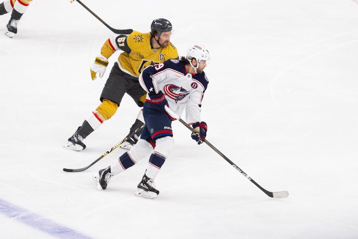 Columbus Blue Jackets center Adam Fantilli (19) skates past Las Vegas Golden Knights right wing Mark Stone (61) during a NHL game between the Las Vegas Golden Knights and the Columbus Blue Jackets, Thursday January 30, 2025 in Las Vegas, Nev.