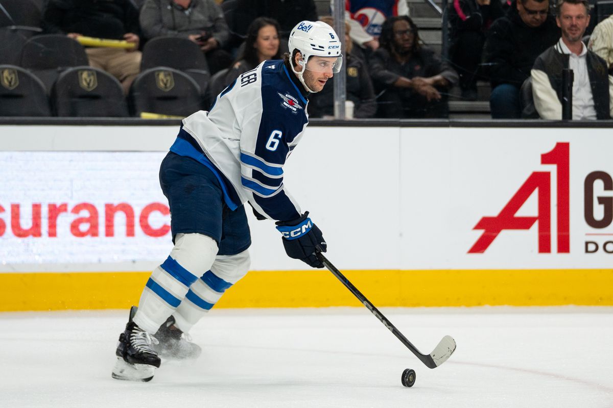 Winnipeg Jets defenseman Colin Miller (6) skates the puck down the ice during third period of NHL game against Vegas Golden Knights on Thursday April 3, 2025 in Las Vegas.