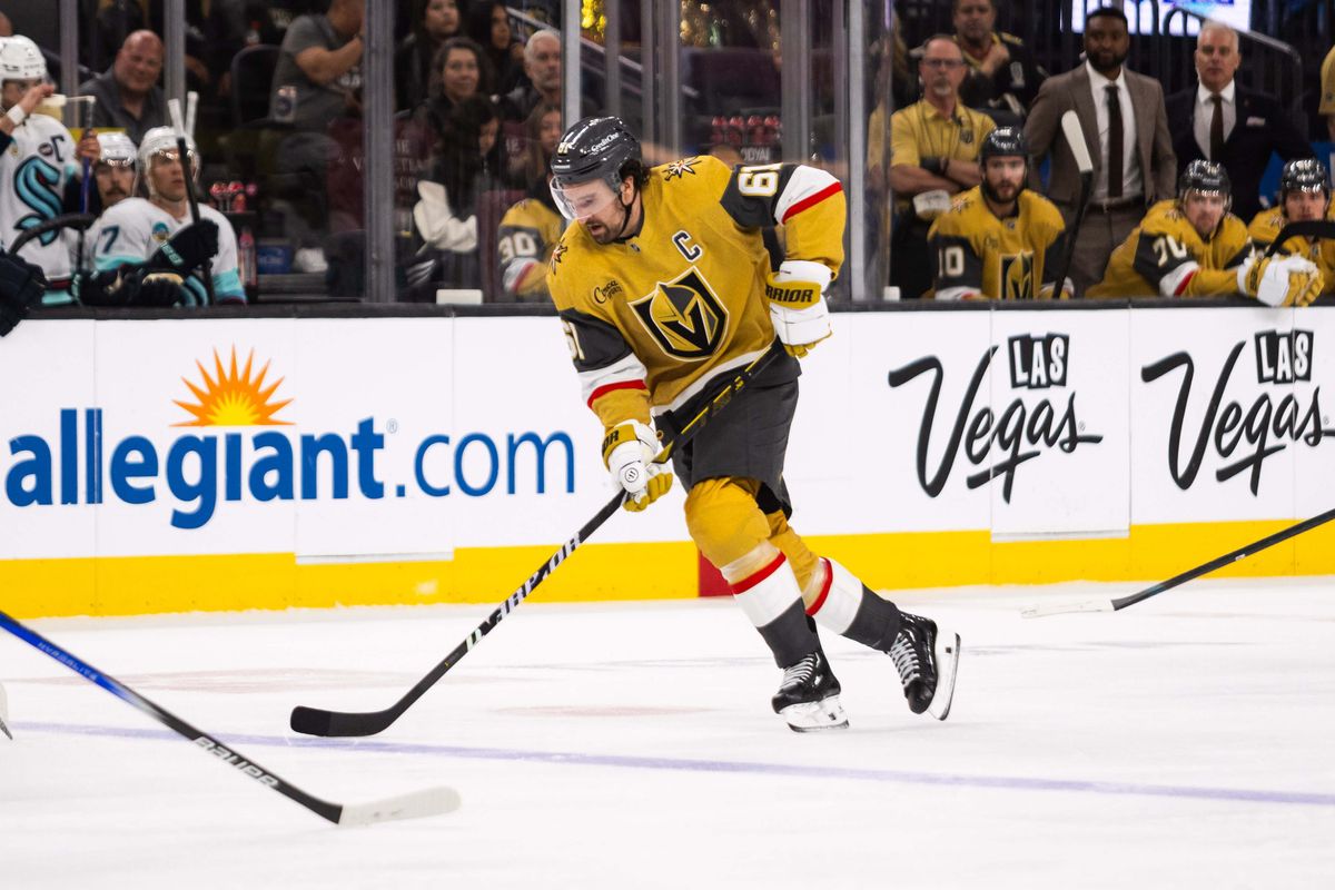 Las Vegas Golden Knights right-wing Mark Stone (61) skates the puck into the offensive zone during a NHL game between the Las Vegas Golden Knights and the Seattle Kraken, Thursday April 10, 2025 in Las Vegas, Nev.