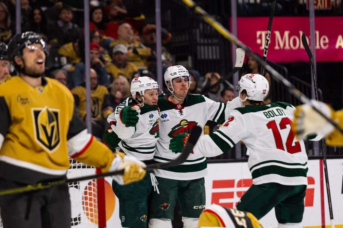 Minnesota Wild left-wing Kirill Kaprizov (97), center Joel Eriksson Ek (14), and left-wing Matt Boldy (12) celebrate after Kaprizov scores a goal during a NHL playoff game between the Las Vegas Golden Knights and the Minnesota Wild, Tuesday April 22, 2025 in Las Vegas, Nev. Minnesota Wild left-wing Kirill Kaprizov (97), center Joel Eriksson Ek (14), and left-wing Matt Boldy (12) celebrate after Kaprizov scores a goal during a NHL playoff game between the Las Vegas Golden Knights and the Minnesota Wild, Tuesday April 22, 2025 in Las Vegas, Nev.