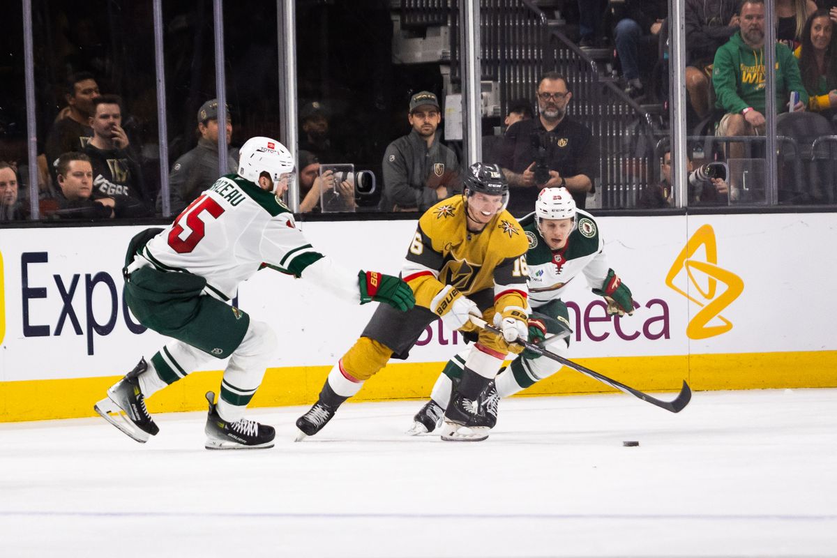 Las Vegas Golden Knights left-wing Pavel Dorofeyev (16) tries to get past Minnesota Wild right-wing Justin Brazeau (15) and center Marco Rossi (23) during a NHL playoff game between the Las Vegas Golden Knights and the Minnesota Wild, Tuesday April 22, 2025 in Las Vegas, Nev. Las Vegas Golden Knights left-wing Pavel Dorofeyev (16) tries to get past Minnesota Wild right-wing Justin Brazeau (15) and center Marco Rossi (23) during a NHL playoff game between the Las Vegas Golden Knights and the Minnesota Wild, Tuesday April 22, 2025 in Las Vegas, Nev.
