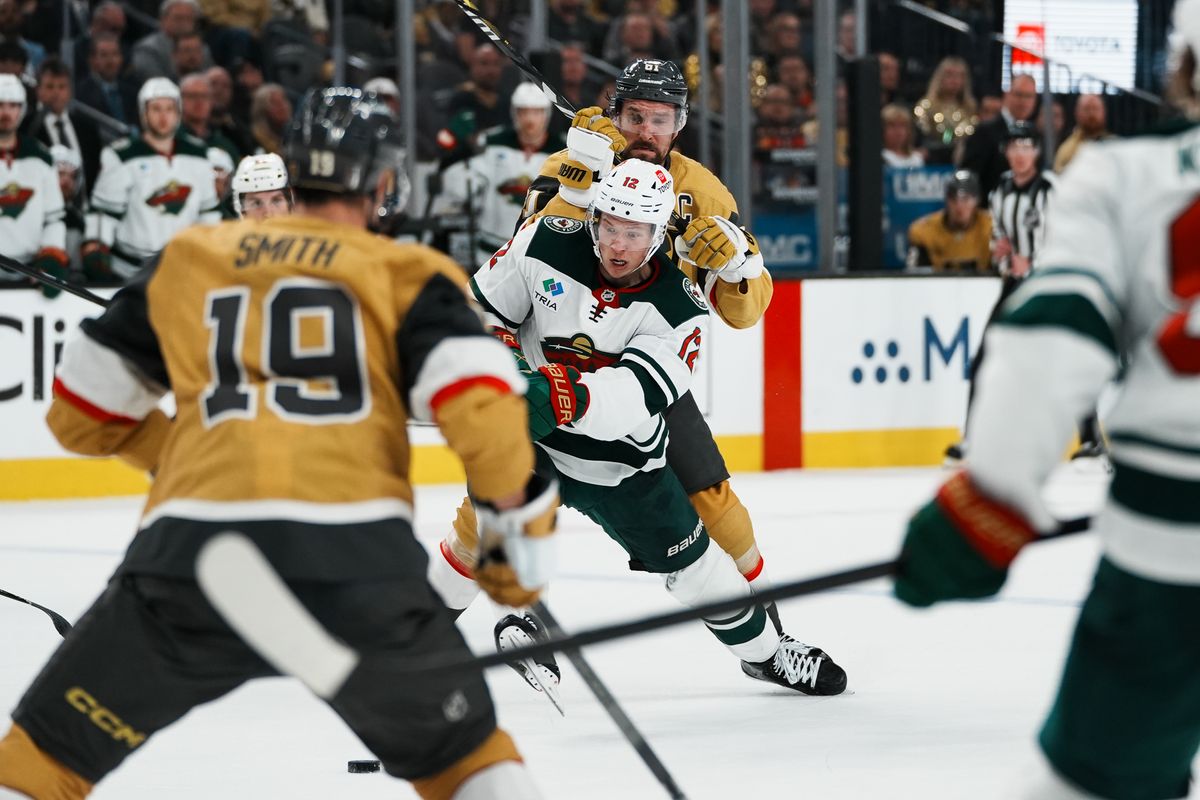 Minnesota Wild left wing Matt Boldy (12) attempts to skate through Vegas Golden Knights defense during second period of NHL playoff game against Vegas Golden Knights on Tuesday April 29, 2025 in Las Vegas.