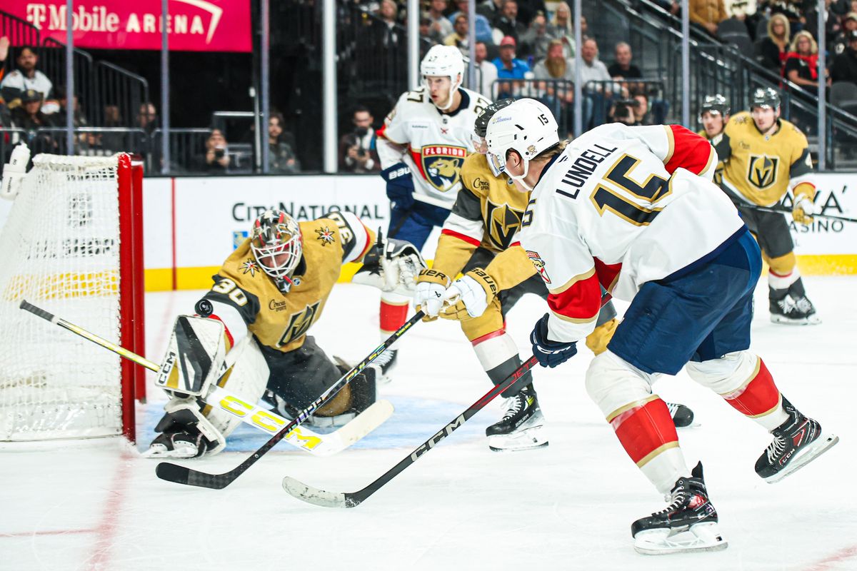 Vegas Golden Knights G Carl Lindbom (30) makes a save against Florida Panthers C Anton Lundell (15) during an NHL game on Monday November 10, 2025, in Las Vegas, Nevada. 