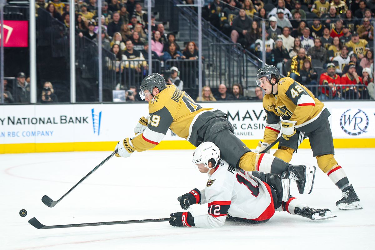  Vegas Golden Knights F Ivan Barbashev (49) shoots the puck in midair during an NHL game against the Ottawa Senators on Wednesday November 26, 2025, in Las Vegas, Nevada. 