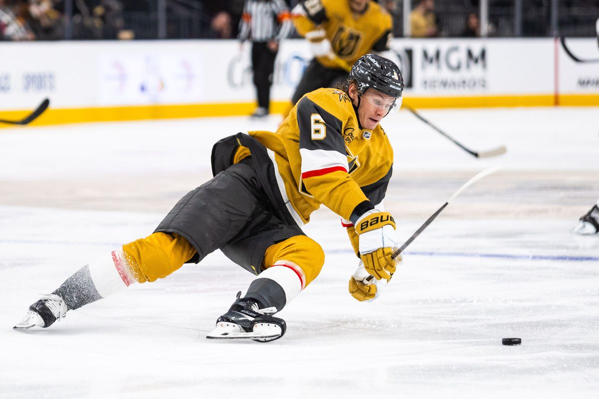 Vegas Golden Knights defenseman Kaedan Korczak (6) slips while skating with the puck during a NHL game between the Vegas Golden Knights and the Chicago Blackhawks, Tuesday December 2, 2025 in Las Vegas, Nev.