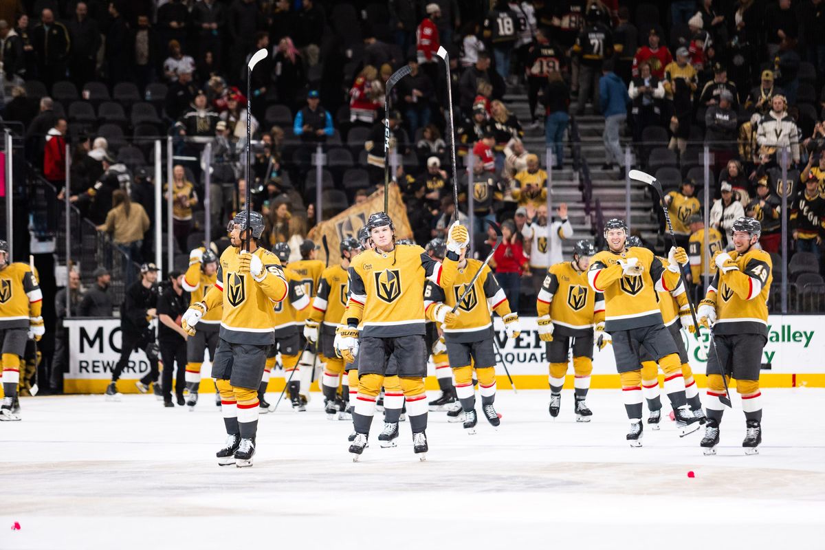 Vegas Golden Knights raise their sticks to the fans after a NHL game between the Vegas Golden Knights and the Chicago Blackhawks, Tuesday December 2, 2025 in Las Vegas, Nev.