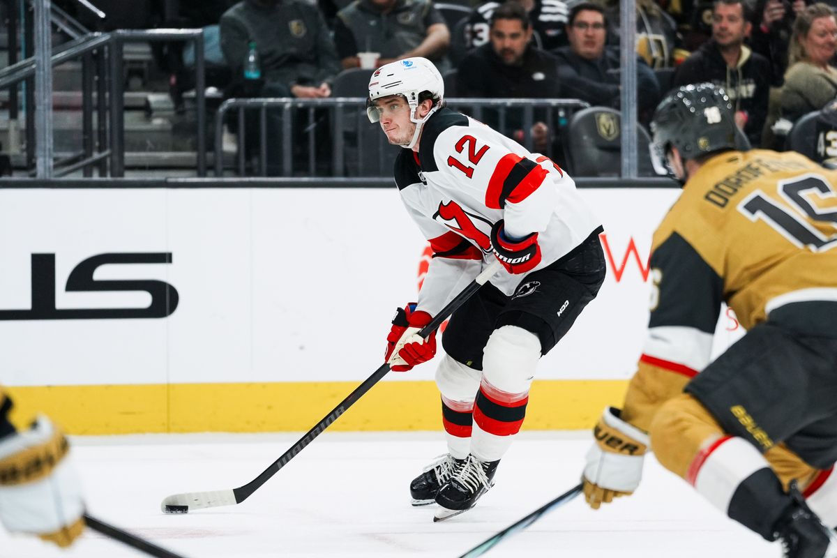 Devils center Cody Glass (12) skates the puck towards the goal during third period of NHL game against New Jersey Devils on Wed., Dec. 17, 2025, at T-Mobile Arena in Las Vegas.