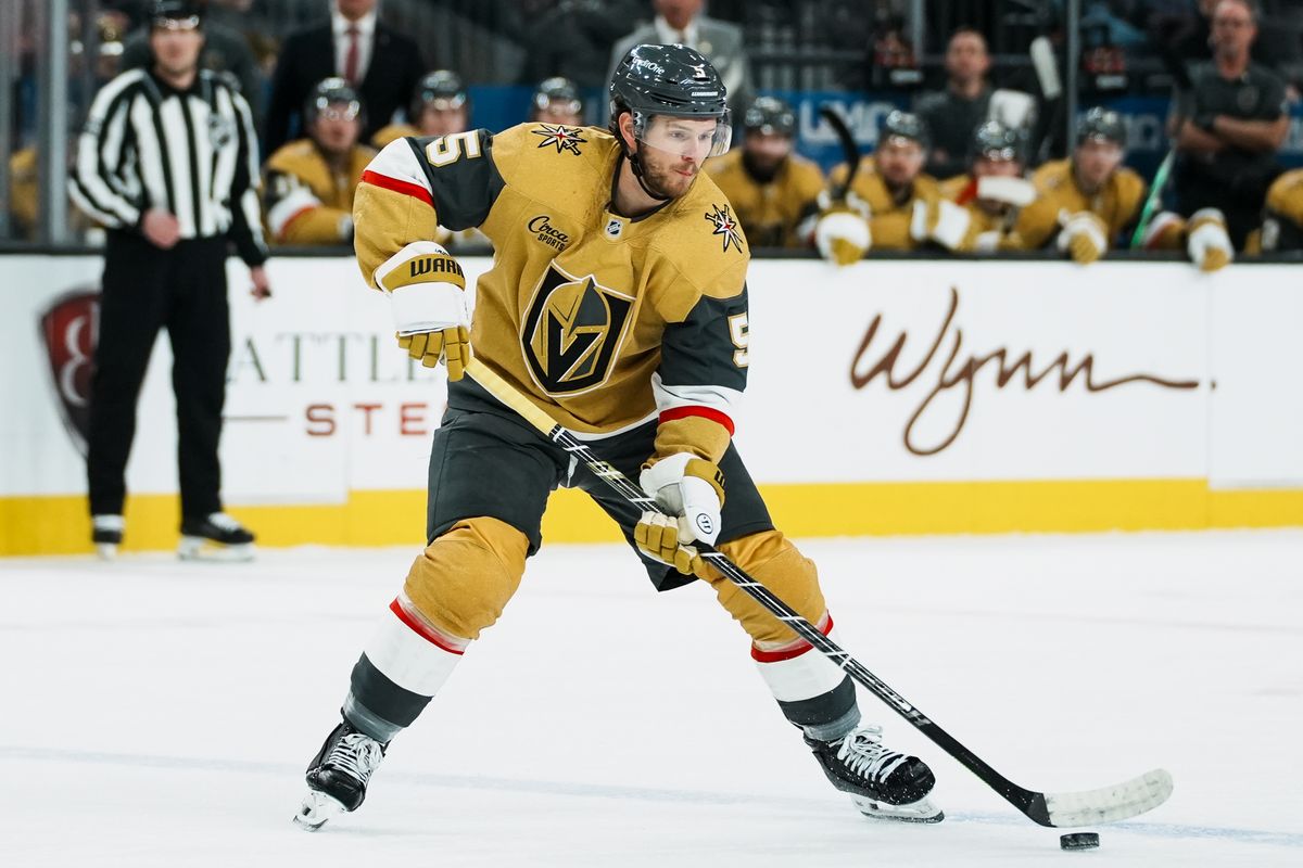 Vegas Golden Knights defenseman Jeremy Lauzon (5) skates the puck down the ice during first period of NHL game against Nashville Predators on Wed. Dec. 31, 2025 at T-Mobile Arena in Las Vegas.