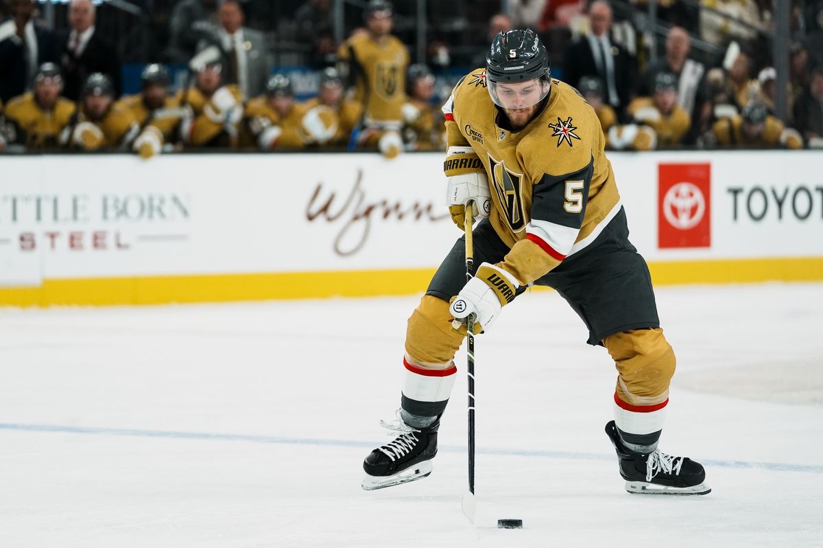 Vegas Golden Knights defenseman Jeremy Lauzon (5) maintains possession of the puck during second period of NHL game against Nashville Predators on Wed. Dec. 31, 2025 at T-Mobile Arena in Las Vegas.