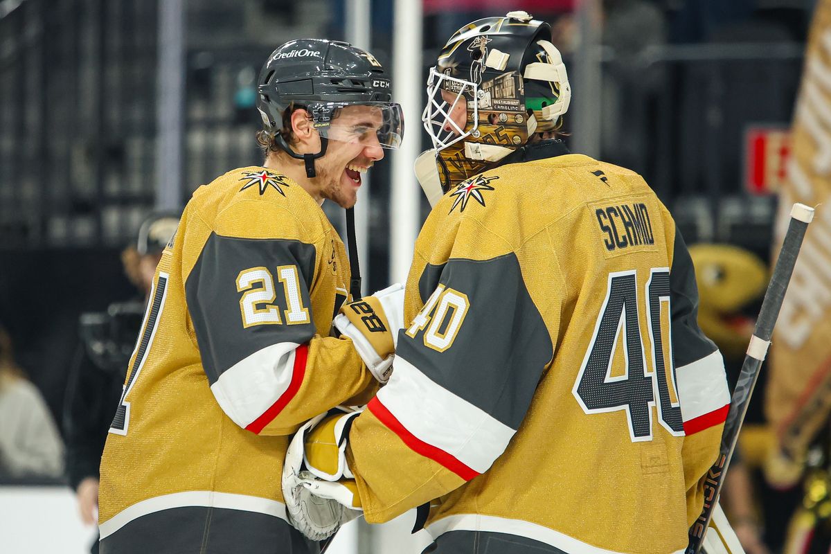 Vegas Golden Knights F Brett Howden (21) and Vegas Golden Knights G Akira Schmid (40) celebrate after defeating the Columbus Blue Jackets on Thursday January 8, 2026, in Las Vegas, Nevada. 