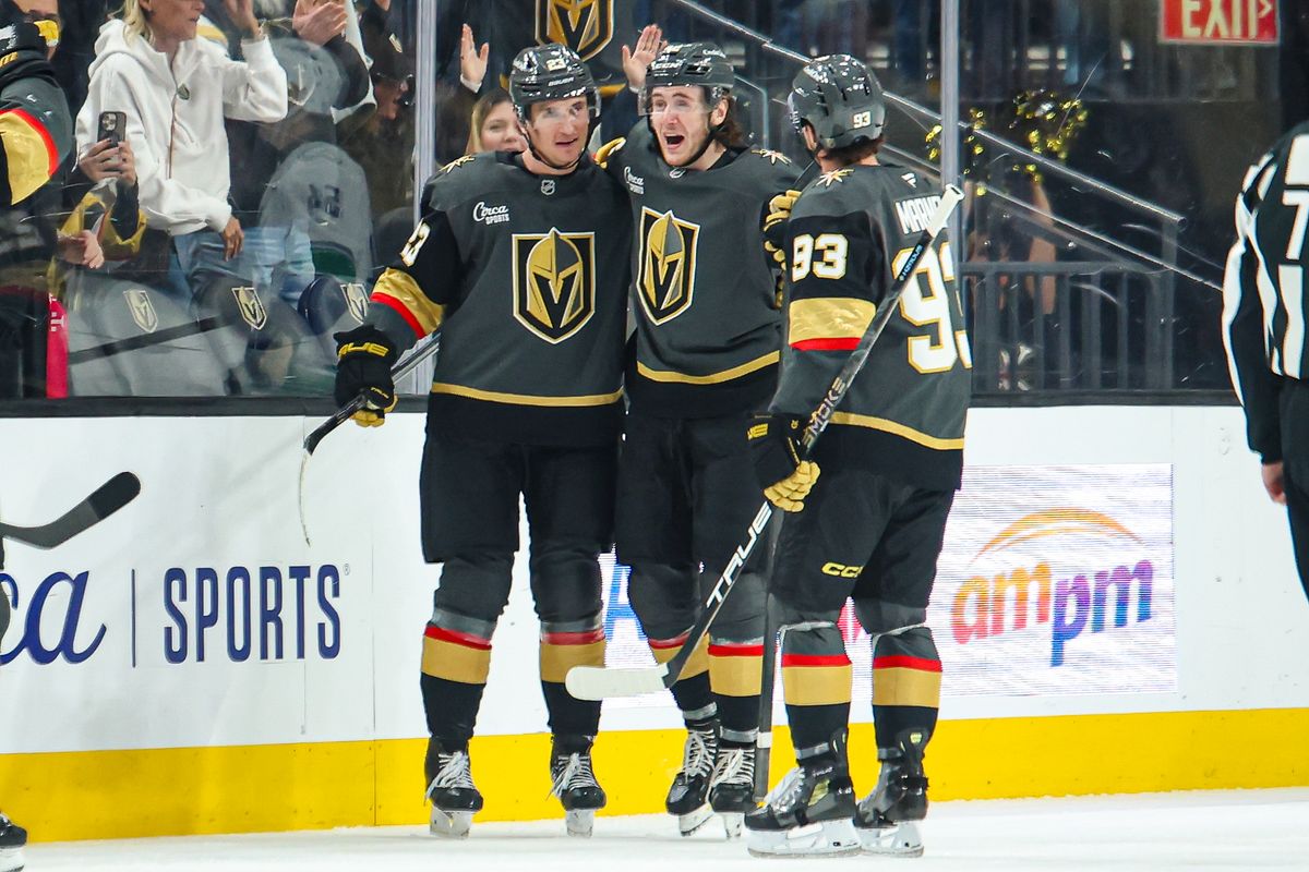 Vegas Golden Knights F Cole Reinhardt (23) celebrates with his teammates after scoring a goal against the Vancouver Canucks on Wednesday February 4, 2026, in Las Vegas, Nevada. 