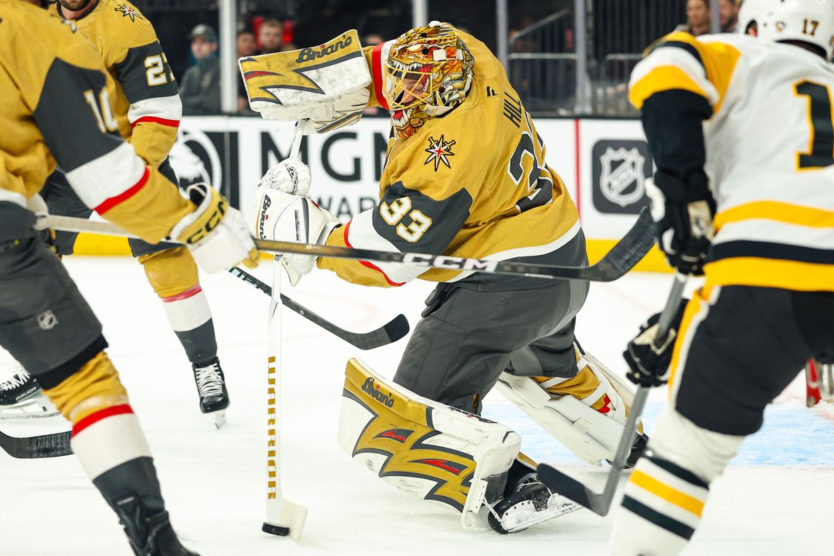 Vegas Golden Knights G Adin Hill (33) ices the puck during an NHL game against the Pittsburgh Penguins on Thursday, March 12, 2026, in Las Vegas, Nevada. 
