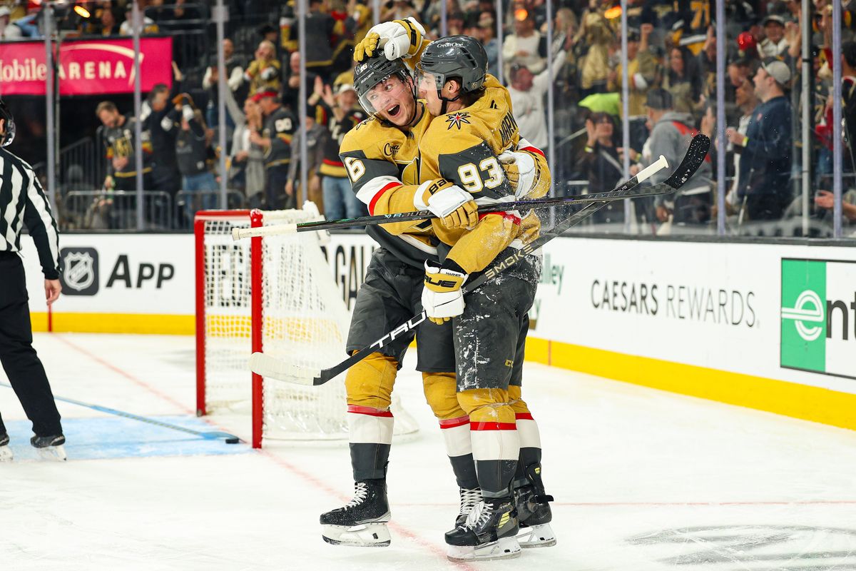 Vegas Golden Knights F Pavel Dorofeyev (16) celebrates with his teammate Vegas Golden Knights F Mitch Marner (93) after Marner scored a goal against the Pittsburgh Penguins on Thursday, March 12, 2026, in Las Vegas, Nevada. 