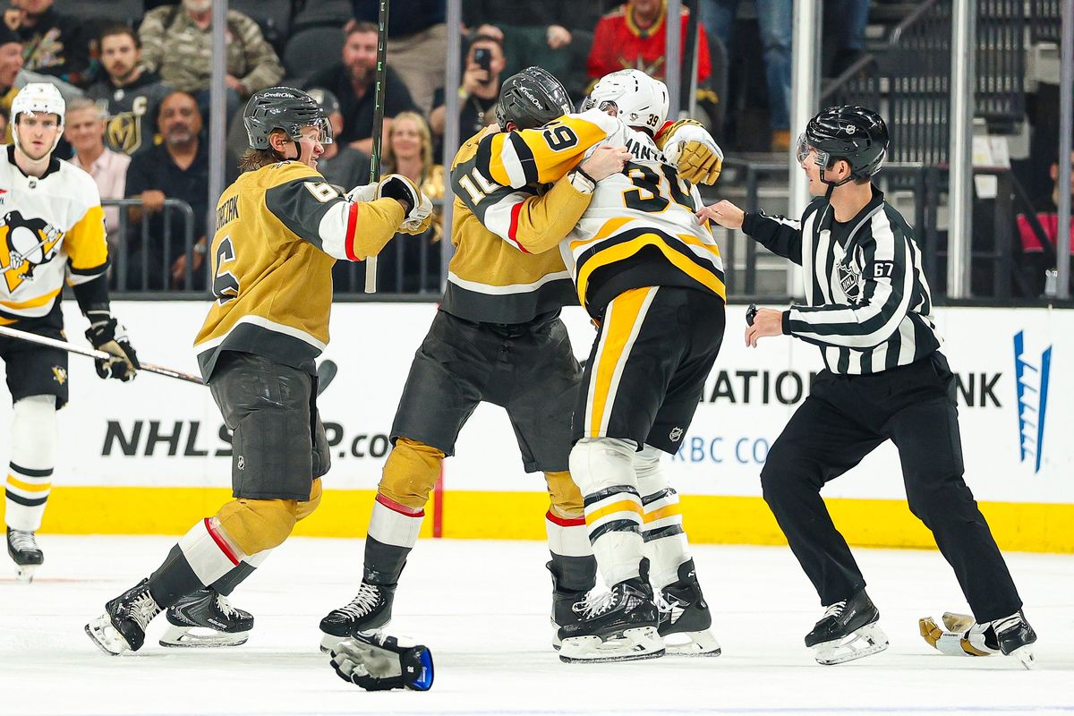 Vegas Golden Knights F Pavel Dorofeyev (16) and Pittsburgh Penguins RW Anthony Mantha (39) draw roughing penalties against each other during an NHL game on Thursday, March 12, 2026, in Las Vegas, Nevada. 