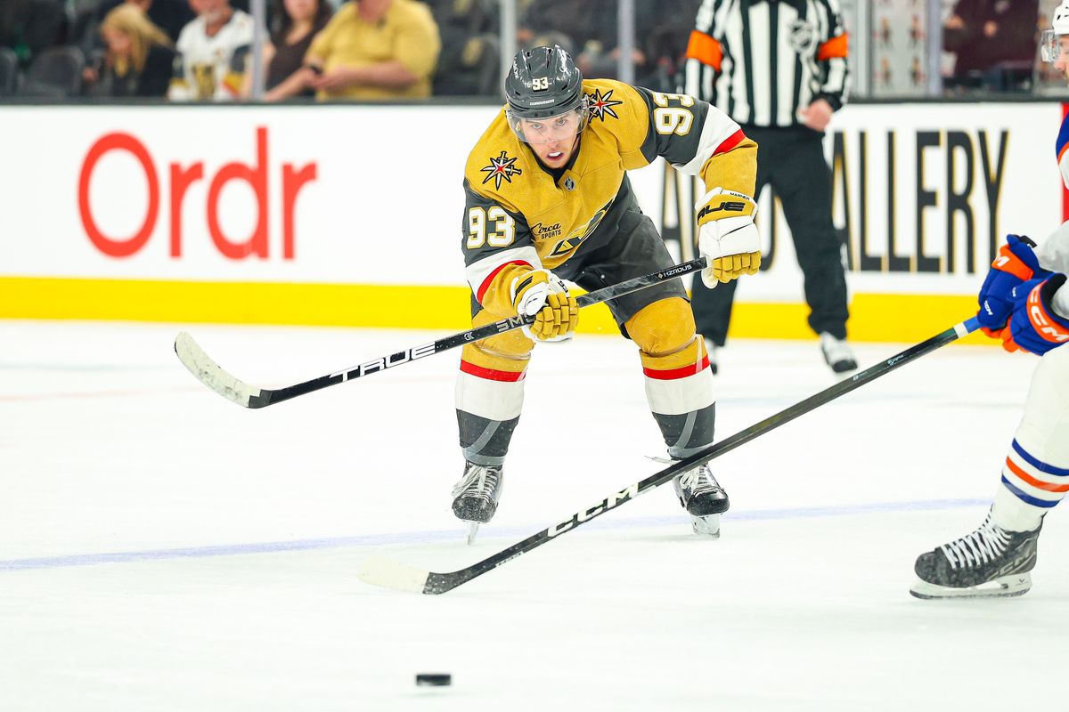 Vegas Golden Knights F Mitch Marner (93) passes the puck during an NHL game against the Edmonton Oilers on Thursday, March 26, 2026, in Las Vegas, Nevada. Vegas Golden Knights F Mitch Marner (93) passes the puck during an NHL game against the Edmonton Oilers on Thursday, March 26, 2026, in Las Vegas, Nevada.