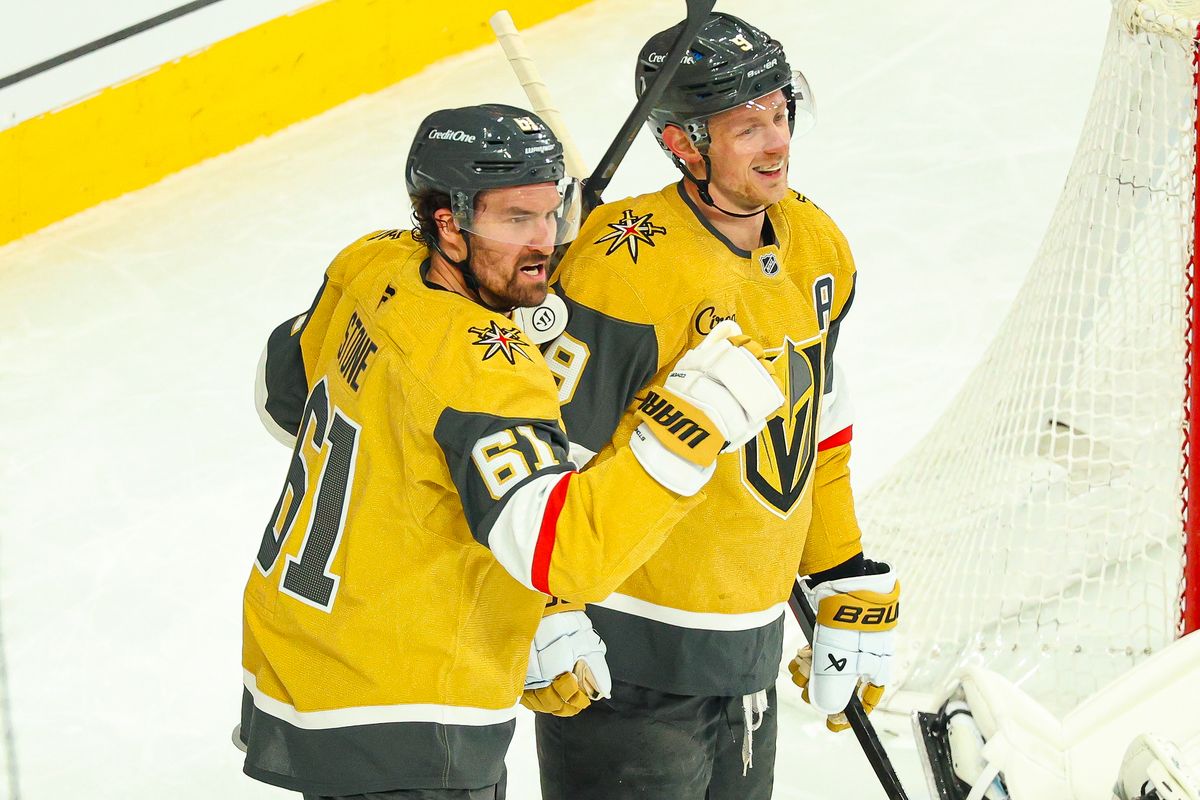Vegas Golden Knights F Mark Stone (61) celebrates with his teammate Vegas Golden Knights F Jack Eichel (9) after scoring a goal against the Winnipeg Jets on Monday, April 13, 2026, in Las Vegas, Nevada. 